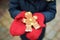 Cute young girl having gingerbread cookie on traditional Christmas fair in Riga, Latvia. Child enjoying sweets, candies and