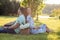 Cute young lovers are resting on the picnic