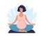 Cute young pregnant woman practices yoga in nature. Activity during pregnancy. Mom meditates in lotus position, the