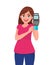 Cute young woman holding a credit/debit cards or pos terminal payment machine and inserting card. Wireless modern bank payment.