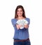 Cute young woman standing and holding dollars