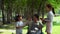 Cute youngest daughter showing dance with mother and oldest sister