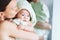 Cutest baby after bath with towel on head.