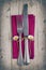 Cutlery - fork and knife on purple napkin in vintage stile