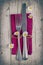 Cutlery - fork and knife on purple napkin in vintage stile