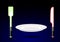 Cutlery from future. Knife and fork as light sword. An empty plate in weightlessness. Cutlery accessories on background of dark s