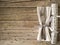 Cutlery kitchenware and cracker on old wooden boards background