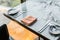 Cutlery Plate, forks. knives and napkin on marble table top for fine dinning