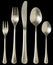 Cutlery Table Set Of Stainless Steel Soup Spoon Dinner Knife And Fork With Dessert Fork And Spoon Isolated On Black Background