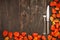 Cutlery on wooden table with Physalis (Chinese lanterns) autumnal Decorated