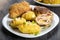 Cutlet cordon bleu and hasselback potatoes