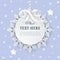 Cutout 3D paper circle frame label with silver satin bow and snowflakes on the light purple background.