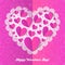 Cutout lacy paper heart on pink ornate background