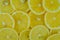 Cutted lemons background. Top view. Citrus fruit lemon