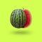 Cutted watermelon isolated on yellow background with a shadow, square