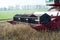 Cutter bar of a combine harvester harvesting a field of soybean