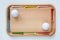 Cutting board with wooden golf tees and golf balls