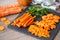 Cutting carrots-Healthy foods, cooking and vegetarian concept