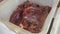 Cutting deer meat after hunting. Saddle of venison in white box. Roe Deer - Wild Game Meat. Hunt concepts