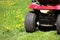 Cutting the grass of on a tractor lawn mower
