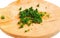 Cutting green dill on a breadboard. Antioxidant food