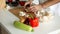 Cutting mushrooms on wooden board