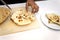 Cutting Plain grill naan bread on a plate with a with background.