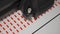 Cutting plotter machine making small round red arrows stickers, closeup detail