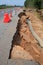 cutting surface of asphalt road inner structure scouring by water flood attack indicated layer of road structure and road making