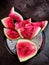 Cutting watermelon in plate Indian thali