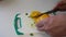 Cutting yellow peppers on cutting board