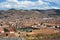 Cuzc-Peru, city and aerial view of the Plaza de Armas and church with a background of mountains on June 2019