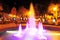 cuzco, beautiful water fountain illuminated with night colors in a city square