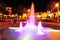 cuzco beautiful water fountain illuminated with night colors in a city square