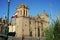 Cuzco, Peru - View of the Plaza de Armas of Cuzco, people and some traffic, and the church of the Company of Jesus