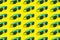 Cyan, aqua menthe sunglasses pattern isolated on background of yellow color.