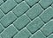 Cyan color cobblestone pavement surface.