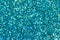 Cyan glitter for texture or background.