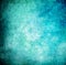 Cyan grunge paint wall background or texture