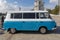 Cyan retro minivan Barkas B1000 at the show of old cars on embankment of Don river. Side view