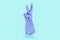 Cyan rubber gloves counting 2 on light blue background