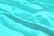 Cyan-Teal satin fabric texture soft blur background