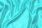 Cyan-Teal satin fabric texture soft blur background