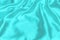 Cyan-Teal satin fabric texture soft blur background