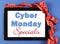 Cyber Monday on tablet device wrapped as a gift.