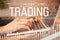 Cyber online trading and business, female hands typing on laptop.