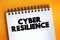 Cyber Resilience text on notepad, concept background