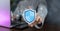 Cyber security and network protection concept, Businessman holding shield protect icon. cybersecurity concept Global network