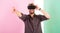 Cyber space. Man unshaven guy with VR glasses involved in cyber space, pink background. Hipster use modern technologies