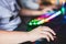 Cyber sport e-sports tournament, team of professional gamers, close-up on gamer\'s hands on a keyboard, pushing button, gamers